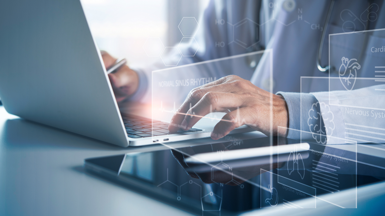 Medical technology, electronic health record system EHRs. Medicine doctor working with laptop computer with health icons, medical data on virtual screen. Image Credit: Adobe Stock Images/tippapatt